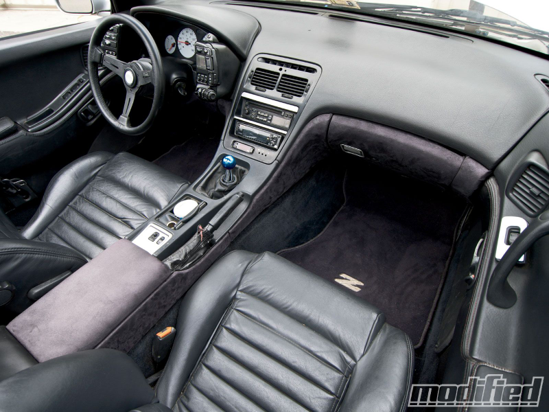 Ignore the goddam ricer bullshit - notice the pods either side of the wheel, the relatively spartan center console. It’s just the radio in there.